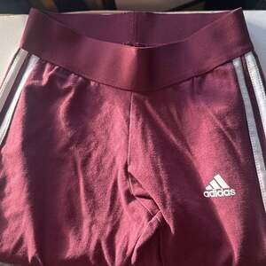 adidas Women's Essentials Slim 3-Stripes Shorts, Shadow Red/White, X-Small